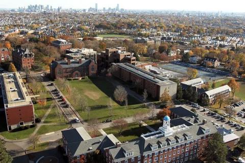 An aerial view of Tufts Medford/Somerville campus, looking toward the Boston skyline