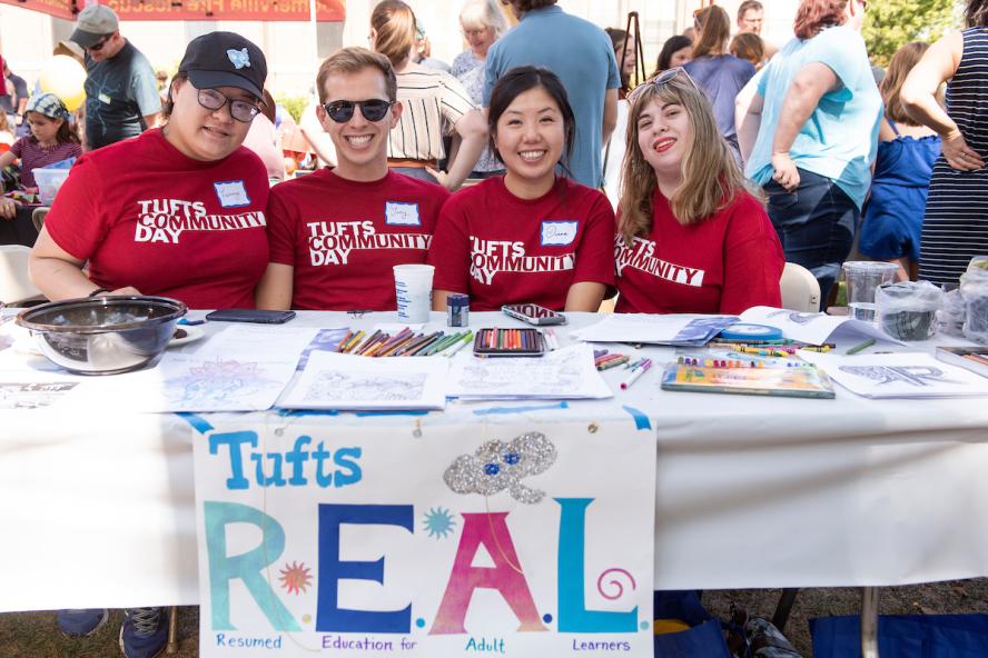 Resumed Education for Adult Learning (REAL) table at Tufts Community Day