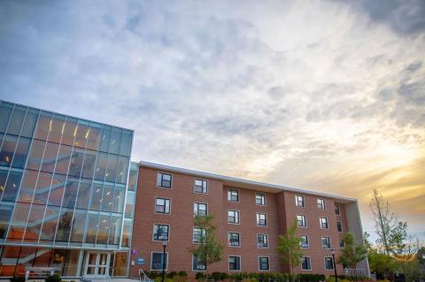 The facade and exterior of a Miller Hall on the Res Quad