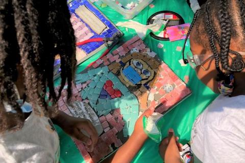 Local youth working on an art project as part of Storywalk, a community art initiative of the Beautiful Stuff Project, based in Somerville, Mass., funded by the Tufts Community Grants program.