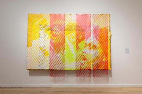 Orange, pink, and yellow lines form an image of people.